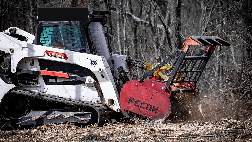 Forestry mulcher clearing brush
